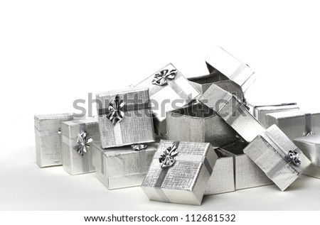 Many silver gifts in a pile