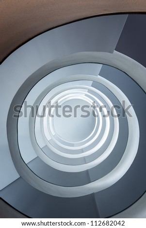 Modern spiral staircase with color shadows
