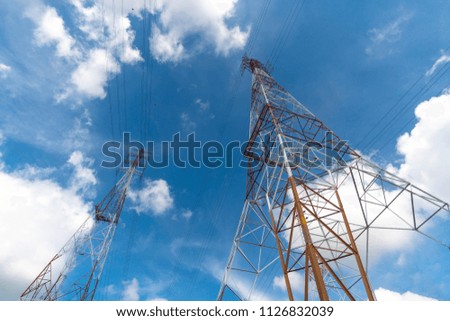 High-voltage tower sky background. Under the high power poles