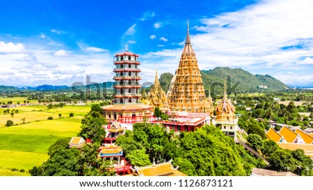 Aerial view of Wat tham suea / Tiger Cave Temple is a temple located on top the hill. Panorama of Wat Tham Suea is Buddhist temple, Big and Beautiful Buddha is famous temple in Kanchanaburi, Thailand