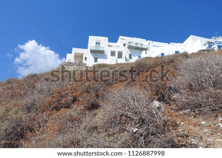 Photo from picturesque and iconic and historic village of Kastro with whitewashed Cycladic houses and breathtaking  views to deep blue Aegean sea, island of Sifnos, Cyclades, Greece