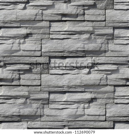 Granite stone gray decorative brick wall seamless background texture Royalty-Free Stock Photo #112690079