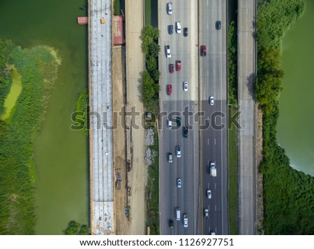 Aerial view of traffic on a major Texas freeway. 