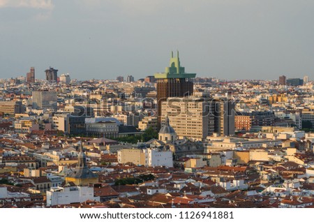 Skyline of the city of Madrid with Colon towers and Santa Barbara church near Paseo de la Castellana