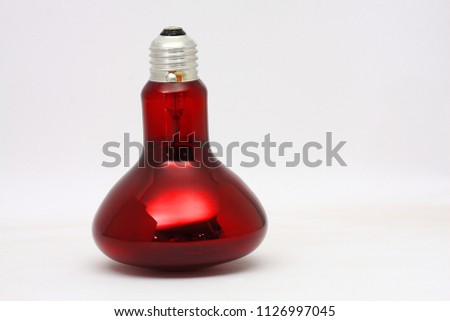 incandescent infrared bulb used in medicine for heating and in black and white photography