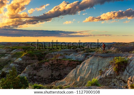 Looking out over the badlands of Theodore Roosevelt National Park, North Dakota Royalty-Free Stock Photo #1127000108