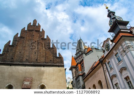 A skyward view at Old-New Synagogue and the Jewish Town Hall in Prague's Jewish quarter of Josefov Royalty-Free Stock Photo #1127008892