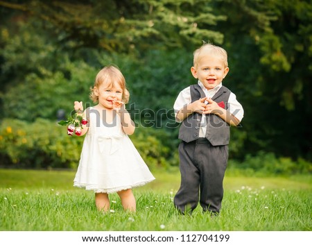 Little boy and girl in the park