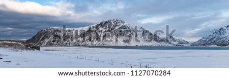 Panorama a Lofoten mountain at winter with snow - Norway