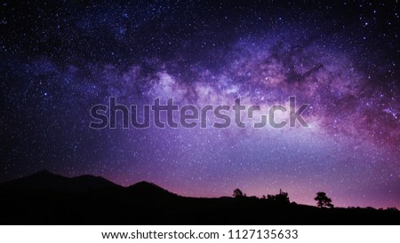 Night sky photo of the Milky Way Galaxy's core over El Teide mountain on Spain's Tenerife island.