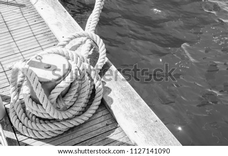rope anchoring ship at the pier
