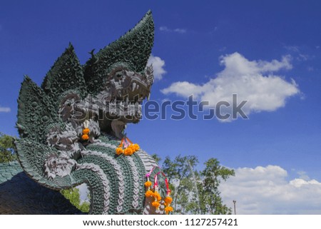 Serpent king or king of naga statue in Thai temple
