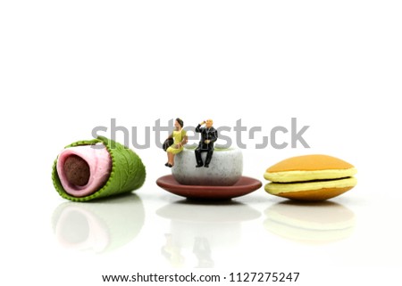 Miniature people : couple of love  with Dessert Japanese traditional confectionery,Sakura Mochi,matcha green tea,Dorayaki