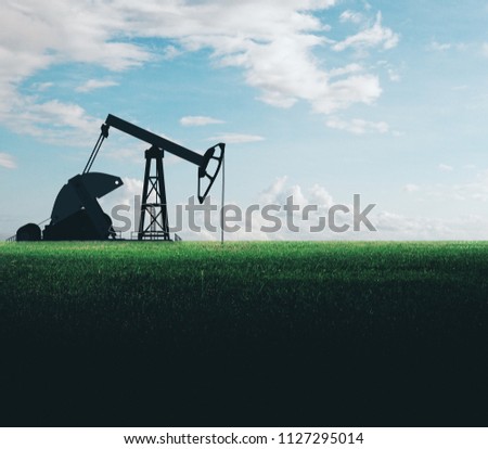 Oil pumping machine in field. Mining and quarrying concept 