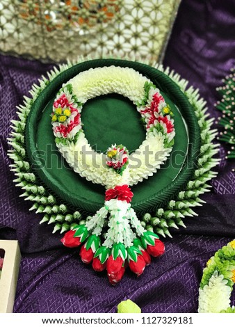 Artificial garland that made of fabric, one of Thailand famous handicraft.