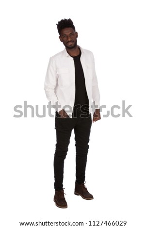 Full-length picture of a young african man hand in pocket, isolated on a white background.