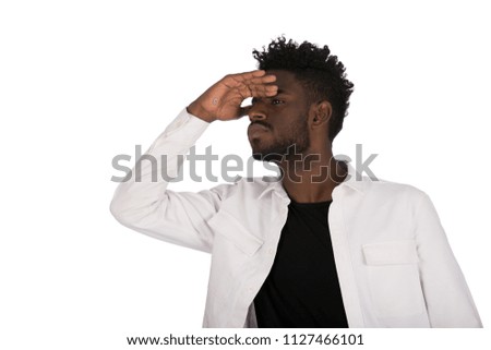 African man looking far away , isolated on a white background.