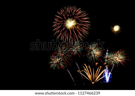 Beautiful color fireworks display on black sky at night for celebration