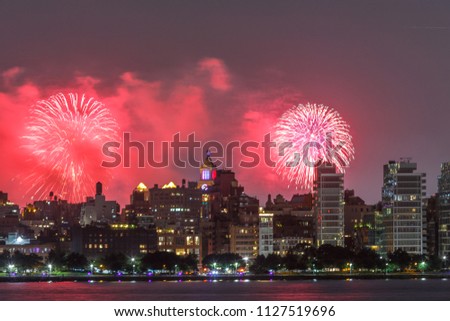 Celebrations July 4th in New York, manhattan skyline from Hudson river and fireworks. 