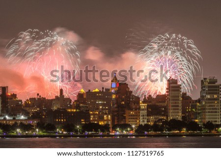 Celebrations July 4th in New York, manhattan skyline from Hudson river and fireworks. 