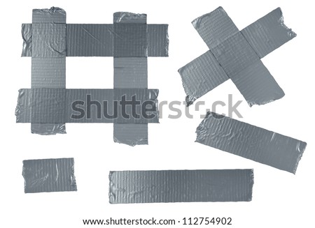 Duct tape or duck tape torn strips of isolated elements of strong adhesive gray material used in packaging boxes or repairing or fixing broken things that need to be sealed air tight. Royalty-Free Stock Photo #112754902
