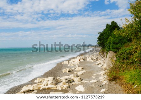 white cliffs and the sea, the beach, kamnip Beach, waves at sea, the chernogm nature of Abkhazia
