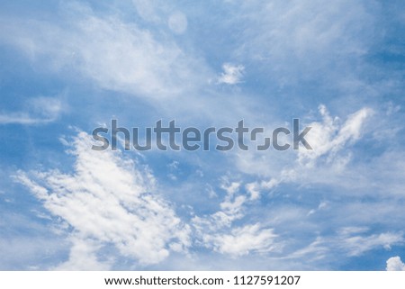 White clouds and blue sky background