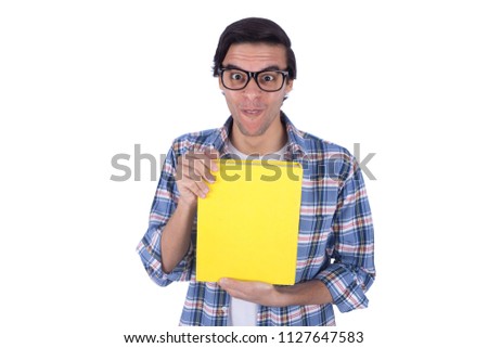 Creepy student holds yellow book with weird face emotion, isolated on a white background.