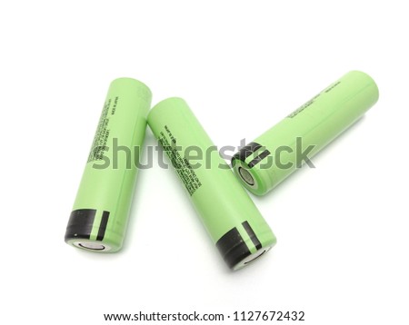 Green lithium-ion battery size 18650 isolated on white background