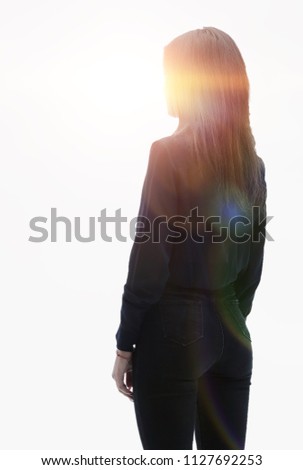 back view . Confident business woman looking forward. Photo in full growth.