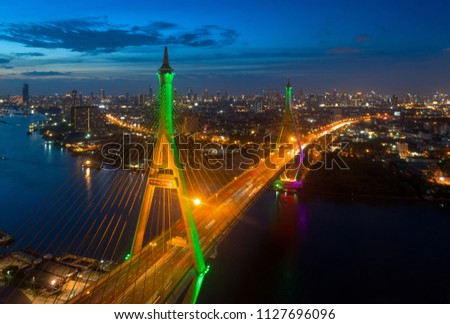 Aerial view of Bhumibol bridge. Aerial view of the highway,expressway and motorway at night, Aerial view interchange of a city, Shot from drone, Expressway is an important infrastructure i