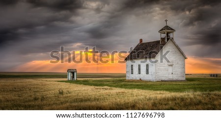 Old Abandoned Church at Sunset Royalty-Free Stock Photo #1127696798