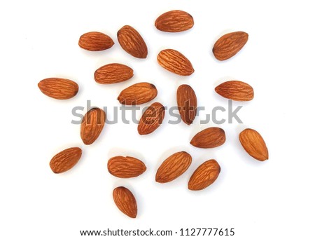 Raw Natural Organic Almonds Nuts Scattered Isolated on White Background Top View Healthy Food for Life Natural Light Selective Focus
