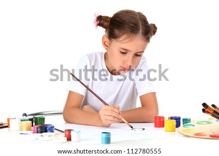 Cute little girl painting a picture, isolated on white