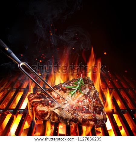 Beefsteak On Grill With Rosemary Pink Pepper And Salt
 Royalty-Free Stock Photo #1127836205