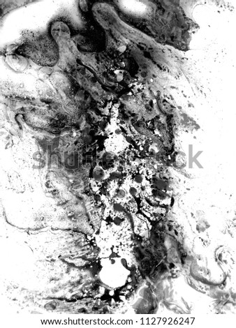 abstract art background . oil and water. The texture of the surface is mixed with water and acrylic and oil. The abstract image is in the form of free white and black.