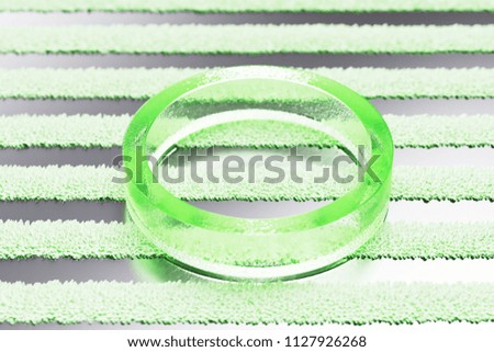 Green Circle Icon on the Silver Stripes Background. 3D Illustration of Green Round, Ball, Basic Icon Set With Striped Pattern.