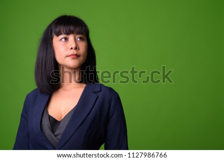 Young beautiful Asian businesswoman