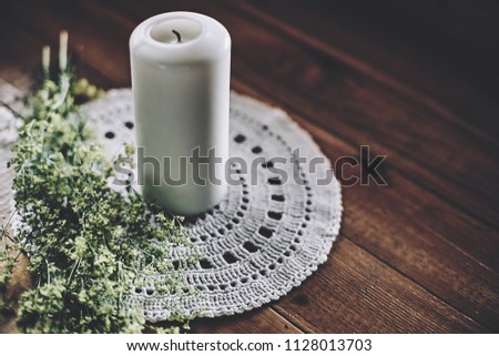 Candle on the wood table                            