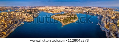 Valletta, Malta - Aerial panoramic skyline view of Valletta, Sliema, Manoel Island, Gzira, Ta' Xbiex, Msida and Floriana at sunrise