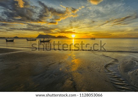 Beach and tropical sea with l boat in thailand
