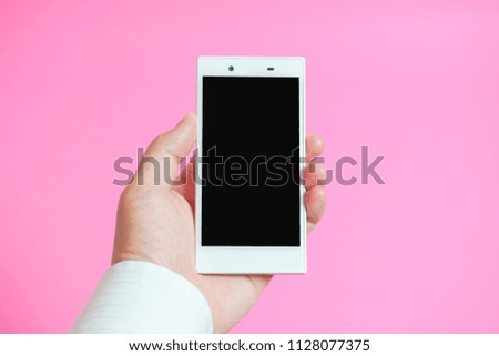 Images using a smartphone. pink background.                               