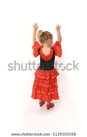 little blonde girl with Spanish clothes