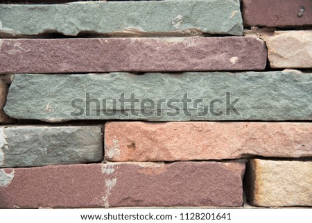 Sandstone bricks seamless of house wall texture background.