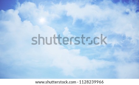 Clouds with the afternoon sun. Animation of clouds in the blue sky