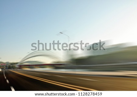 Motion blurred of the asphalt road in city center, Jiangmen, Guangdong, China 