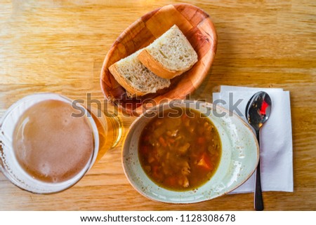 Traditional Icelandic lamb goulash, bread and beer, summer time, indoor