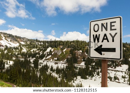 One Way drive along highway in scenic Mount Rainier National Park Washington State