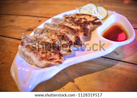 Photo of a fried dumpling that can be used for food blogging and food and beverage pictures