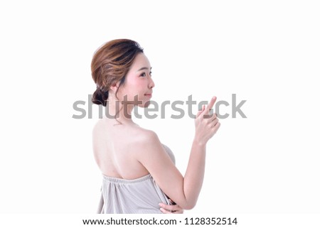 The concept of healthy beautiful woman. Beautiful women keep healthy. Beautiful women are present. Beautiful woman pointing fingers on white background.